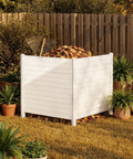 Lightweight PVC Privacy Fence Panels Set 48W By 45.4H Inches, 2 Panels With Nail And Hammer, enclosing garden area with plants.