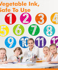 Kids Math Posters Pack With 12 Round Posters Showing Numbers 1 To 12 And A Multiplication Chart in a classroom setting.