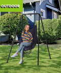 Built To Last Heavy Duty Hammock Chair Stand With A Type Frame For Maximum Stability And A 300 Lbs Load in a garden setting