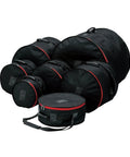 Top Shelf 7 Piece Drum Bag Set With Heavy Bass Drum Case And Tom Covers Featuring ergonomic rubber handles, black padded bags.