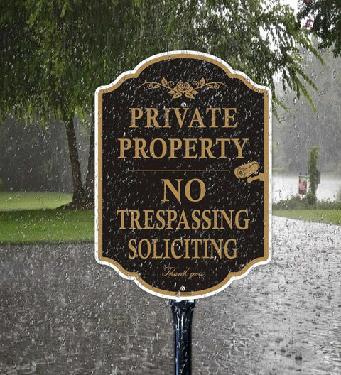 Top Shelf Rust Free Aluminum Private Property Signs With Heavy Duty 36 Inch Stakes For Legit No Trespassing And No Soliciting Video Surveillance Warning Slick Yard Protection Two Pack in the rain.