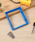 1/2-Inch Double Outlet Box Extender For 2-Gang Electrical Boxes Blue Receptacle Extender With Four Mounting Screws shown with tools