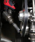 Mechanic using Beefy Built Tough Harmonic Balancer Puller Socket Set With Crankshaft Bolt Removal Tools on vehicle engine
