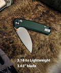 Rockshark EDC Folding Pocket Knife With 3.03 Inch 14C28N Drop Point Blade Green Micarta Handle on fur