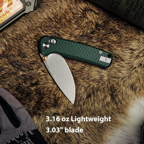 Rockshark EDC Folding Pocket Knife With 3.03 Inch 14C28N Drop Point Blade Green Micarta Handle on fur