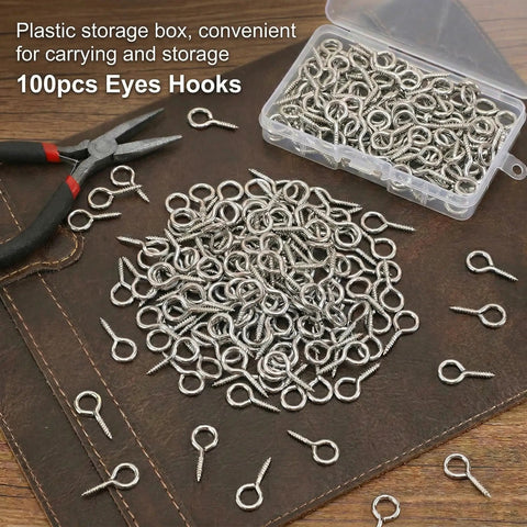 Heavy Duty Screw Eye Hooks 1 Inch Self Tapping Eye Bolts for Wood Ideal DIY Arts and Crafts Projects Indoor Outdoor Hanging Artwork Photos Wind Chimes Lights More 100 Pieces displayed with open storage box and pliers on a leather surface