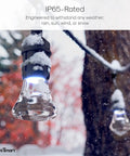 Close-up of a shatterproof bulb on WiFi Enabled Color Changing Outdoor String Lights 48Ft, showing IP65 weatherproof design in snow.
