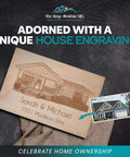 Wood cutting board engraved with a house and names Sarah & Michael, 2351 Madison Way; inset image of blue house.