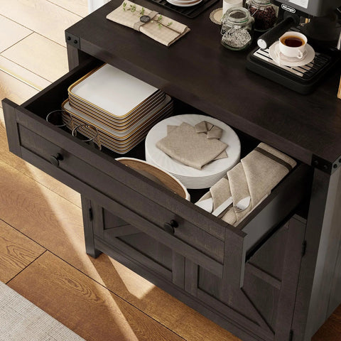 Open drawer of dark brown coffee bar cabinet with plates and napkins, part of coffee bar cabinet with drawer and two door cabinet modern farmhouse kitchen storage sideboard barn door accent buffet for dining room or entryway adjustable shelves and sturdy wide top for microwave and small appliances dark brown