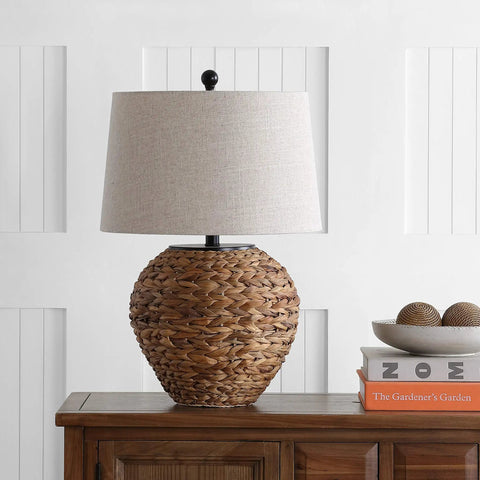 Natural Water Hyacinth Farmhouse Basket Table Lamp 24.5 Inch With Light Gray Linen Shade on wooden nightstand