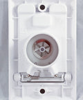 Hayden white central vacuum wall inlet interior view; circular hose port and spring latch visible.