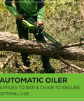 Person using 82V 18 Inch Brushless Cordless Chainsaw With 2.7kW Power, 210 Cuts Per Charge, 4.0Ah Battery for tree trimming.