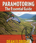 Cover of 'Paramotoring The Essential Guide' featuring powered paraglider in flight over scenic valley, grass and gear visible.