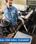 Person using 6 Gallon Ash Vacuum With 8 Amp Motor, Ultra Quiet Power, Beefy Suction, Portable Shop Vac With Carry Handle And Caster Wheels, Onboard Accessory Storage, LED Work Light, Black on grill.