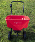 Front view of Beefy Workhorse Walk Behind Broadcast Spreader for Grass Fertilizer and Seeds with 65 Pound Hopper on lawn