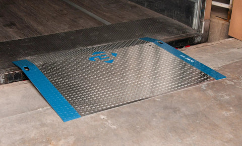 Rock Solid 60 By 48 Inch Aluminum Dock Plate Trailer Ramp With Bolt On Steel Legs Osha Ansi Compliant on warehouse loading dock.