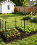 Six Panels Black Chicken Wire Garden Fence Set Keeps Critters Out Of Veggies And Lets You Shape It Into Rectangles Or Squares Includes Stakes For Raised Beds installed around vegetable garden.
