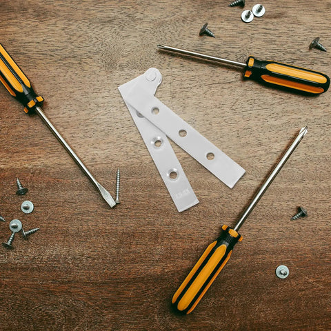 Stainless Steel Swinging Door Hinges Set With Concealed Pivot on wood table with tools and screws