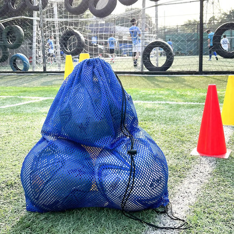 3 Pack Mesh Dive Bags Oversized 19x27 Inch Drawstring Snorkel Gear Bags on sports field with cones and soccer balls visible inside.
