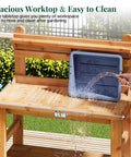 Solid Fir Wood Outdoor Potting Bench With Large Tabletop Heavy Duty Garden Workstation shown with removable plastic bin
