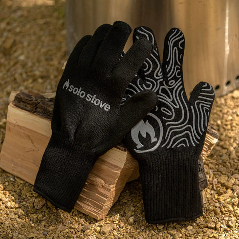 High Heat Grill Gloves For Cooking And BBQ on logs, universal fit, non slip grip, heat resistant up to 450F, black kitchen gloves