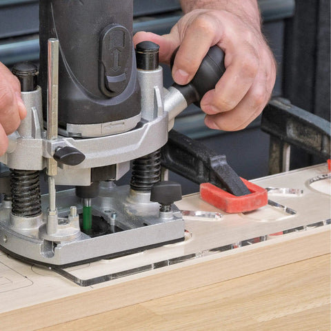 Kick Your Sign Making Routine With This Slick Clear Plastic Routing Template Set Packing Vintage Vogue Block Numbers Scaled Just Right For Dead On Precision On Every Router Job Today. Close-up of plunge router in use on wooden surface.