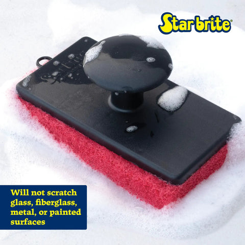 All-Purpose Scrubber Pad With Ergonomic Handle In Red on soapy surface