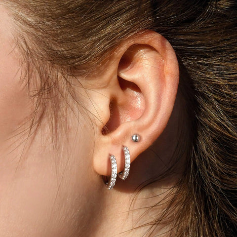 Stainless Steel Earring Set For Women, 10 Pairs, Includes Small Huggie Hoops, CZ Studs, And Glossy Spherical Studs, Versatile Stainless Steel Jewelry For Everyday Piercing Looks on ear