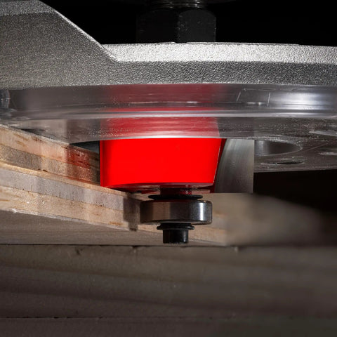 Close-up of the Heavy Duty Multi Rabbet Router Bit Set With Four Swappable Bearings and Grip Tight Quarter Inch Shank in use.