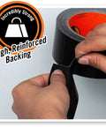 Hands pulling Black Duct Tape Heavy Duty Double Thick 1.88 Inch By 12 Yard Roll Pack Of 18 for indoor and outdoor use.