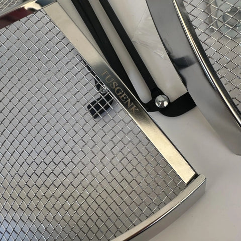 Close-up of 15 Inch Stainless Steel Fire Pit Spark Screen With Detachable Mesh Smokeless Shield And Grill Function for safe use.
