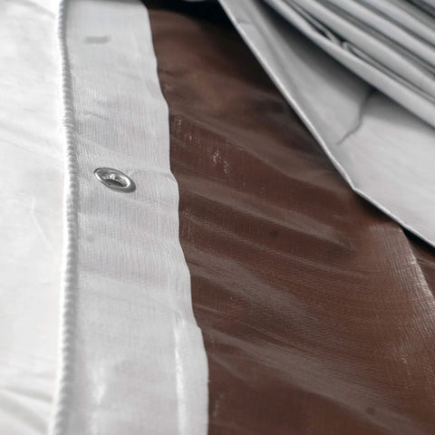 Close-up of 12 Ft By 40 Ft Tough As Nails Heavy Duty Waterproof Tarp with D Rings showing reversible white and brown surfaces.