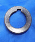 Top Shelf Bulk Lot Of Eight Precision Milling Machine Arbor Spacers For Your Shop Rig One Inch To One Nine Sixteenths Inside Diameter, steel spacer viewed from above.