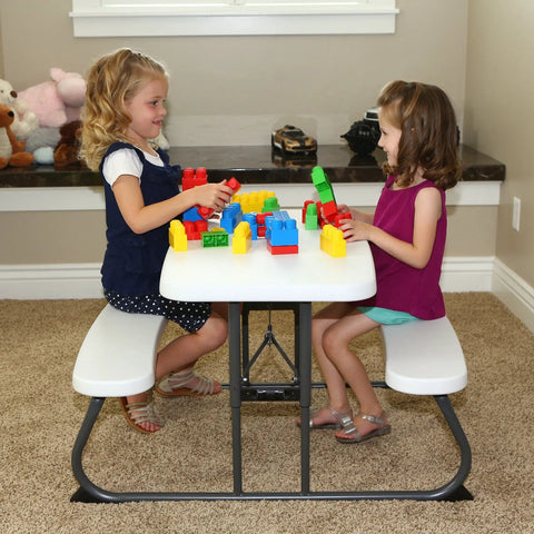 Kids Picnic Table With One Hand Adjustable Squeeze Button Setup Folds Flat For Easy Transport Seats Four Kids Comfortably Stain Resistant And Easy To Clean Durable Steel Frame With All Weather Finish In White