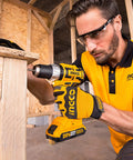 Man using 20V Brushless Impact Drill Kit With Metal Shell And Efficient Cooling For Cooler Run Time Longer Battery Life High Torque Tool Set