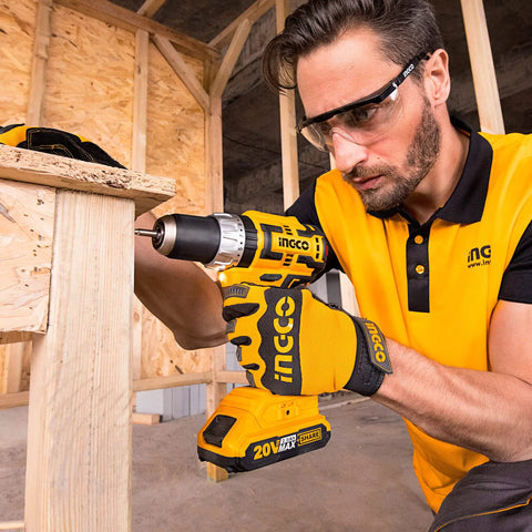 Man using 20V Brushless Impact Drill Kit With Metal Shell And Efficient Cooling For Cooler Run Time Longer Battery Life High Torque Tool Set
