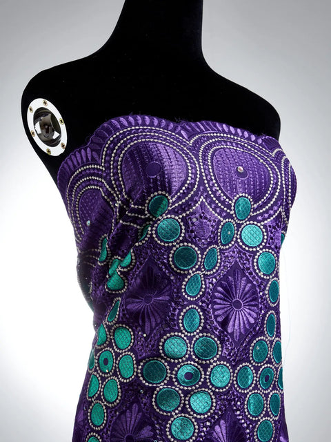 African Lace Fabric 5 Yards Jacquard Guipure Embroidery Floral Lace for Party Dress Sewing in purple with turquoise accents on mannequin