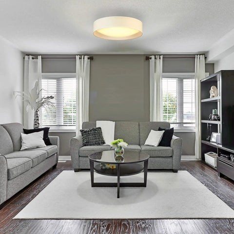 Orme 20 Inch Flush Mount LED Ceiling Light Fixture With Dimmable Option in a modern living room setting, white finish.