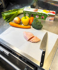 EZ Board Disposable Plastic Cutting Board For Quick Cleanup And Easy Food Prep On The Go with vegetables and knife