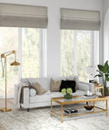 Solid Wheel Pulley Floor Lamp With Brass Dome Shade And Industrial Steel Base in modern living room setting