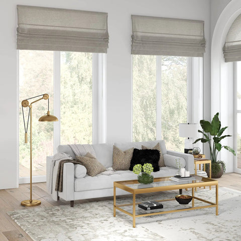 Solid Wheel Pulley Floor Lamp With Brass Dome Shade And Industrial Steel Base in modern living room setting