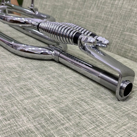 Close-up of 26 Inch Springer Fork For Cruiser Bicycles With Dual Spring Suspension, chrome finish, steel construction.
