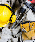 SOMADA 1-in x 39-in SDS Plus long drill bit with carbide tip, shown with yellow hard hat and tool belt amid concrete rubble