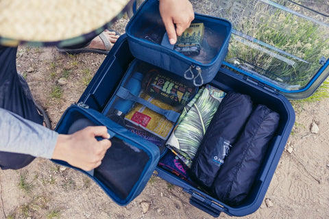 Open Alpaca 45L Waterproof Gear Box For Camping And Outdoor Organization With Clearview Removable Lid Mirage Tan showing contents