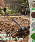 Heavy Duty Metal Bow Rake With 62 Inch Adjustable Handle Dual Sided Dethatching Rake For Lawns Leaves Rock Debris And Yard Landscaping Built From Forged Manganese Steel For Tough Jobs used on soil in a garden