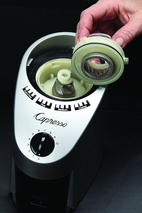 Top Shelf Conical Burr Coffee Grinder Featuring Commercial Steel Burrs showing removable burr with adjustable settings dial.