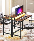 Small Computer Desk With Charging Station And LED Lights, Gaming Desk With Monitor Stand, 2-Tier Home Office Desk With 4 Side Hooks