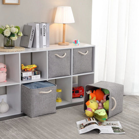 Hella Roomy Gray Fabric Cube Storage Boxes With Quick Fold Down Design For Closets And Shelving Units featuring toys and soft texture.