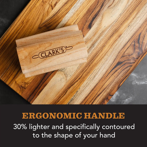 Cutting Board Oil And Wax Applicator With Ergonomic Handle on wooden butcher block surface
