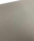 Beige sunshade fabric for sunroof cover; close-up texture